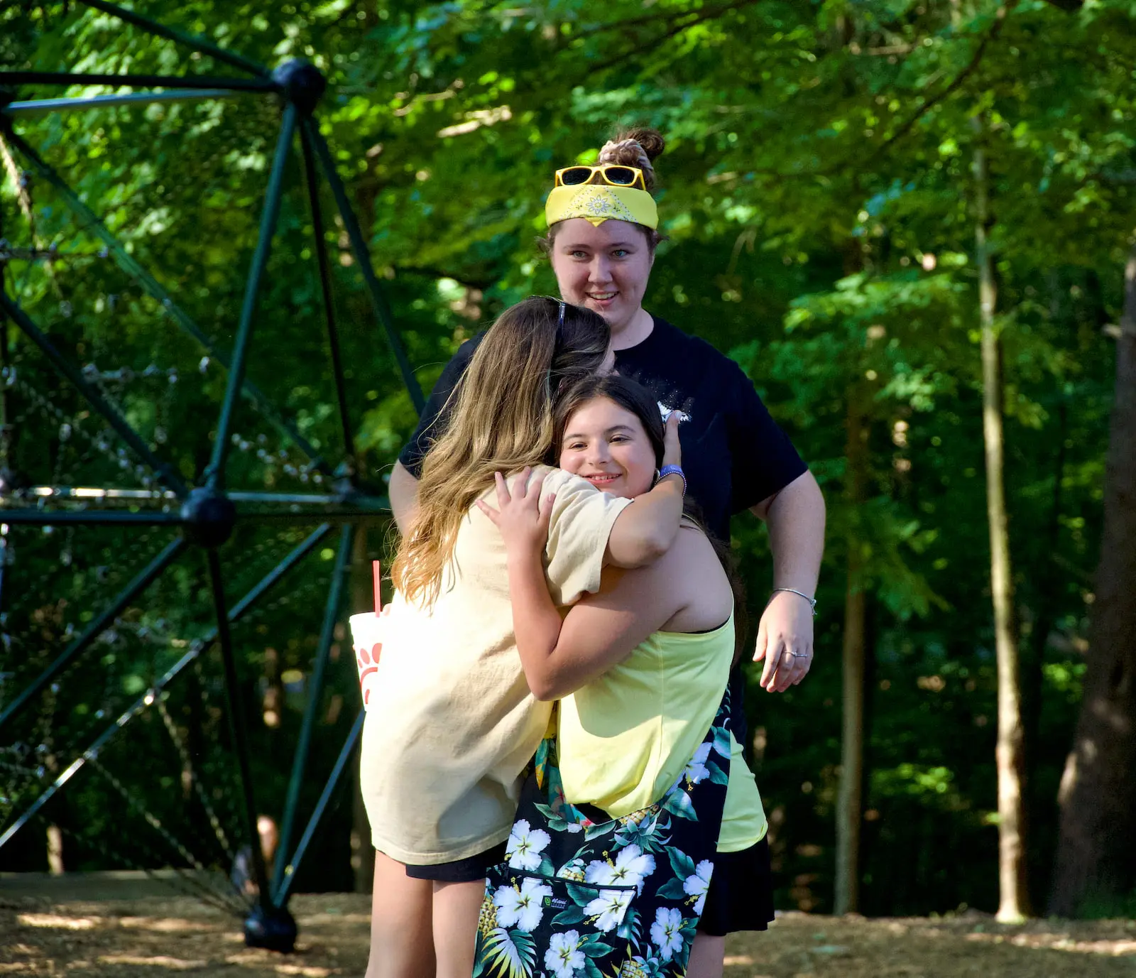 Two girls hugging and encouraging one another during a Christian women’s retreat