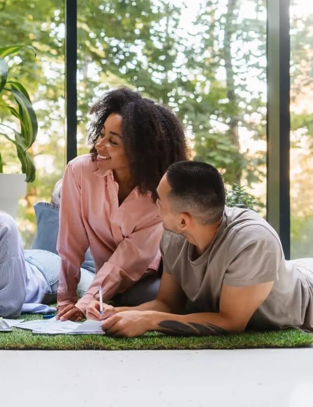 Two girls hugging and encouraging one another during a Christian women’s retreat